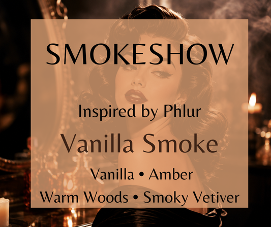 Smokeshow blends velvety vanilla, warm amber, aromatic woods, and smoky vetiver into a soft, smoldering vanilla fragrance with cozy depth. Available in Perfume Oil, Body Spray, Body Oil & Lotion