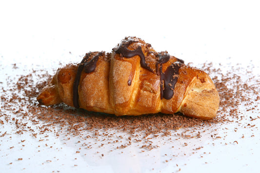 CHOCOLATE CROISSANT - Warm, fresh-baked chocolate croissants filled with a delicious hazelnut cream, topped off with a chocolate drizzle.   Available in Perfume Oil, Body Spray, Fragrance Oil, Solid Perfume, Soap, Lotion, Wax Melts, Cologne, Beard Balm and More. 