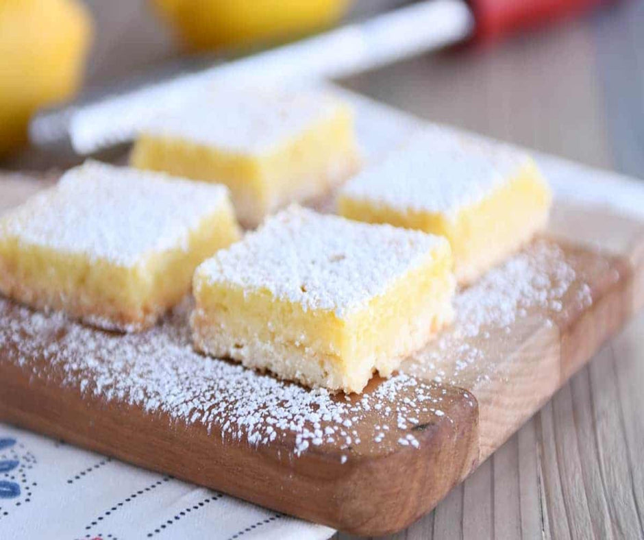 LEMON BARS - Experience the zesty burst of lemon juice and lemon peel, complemented by delicate hints of bergamot. As you take a bite, savor the delightful crunch of pecans, buttery almonds, and the sweetness of brown sugar and sweet milk. All of this goodness rests upon a heavenly sugar cookie crust that will leave you craving for more. Treat yourself to the perfect balance of citrusy tang and irresistible sweetness with our Lemon Bars.   Available in Perfume Oil, Body Spray, Body Oil & Lotion